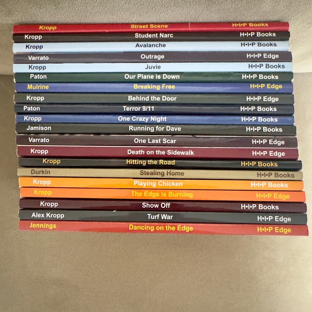 Assorted Paperback Book Spines in Mixed Colors